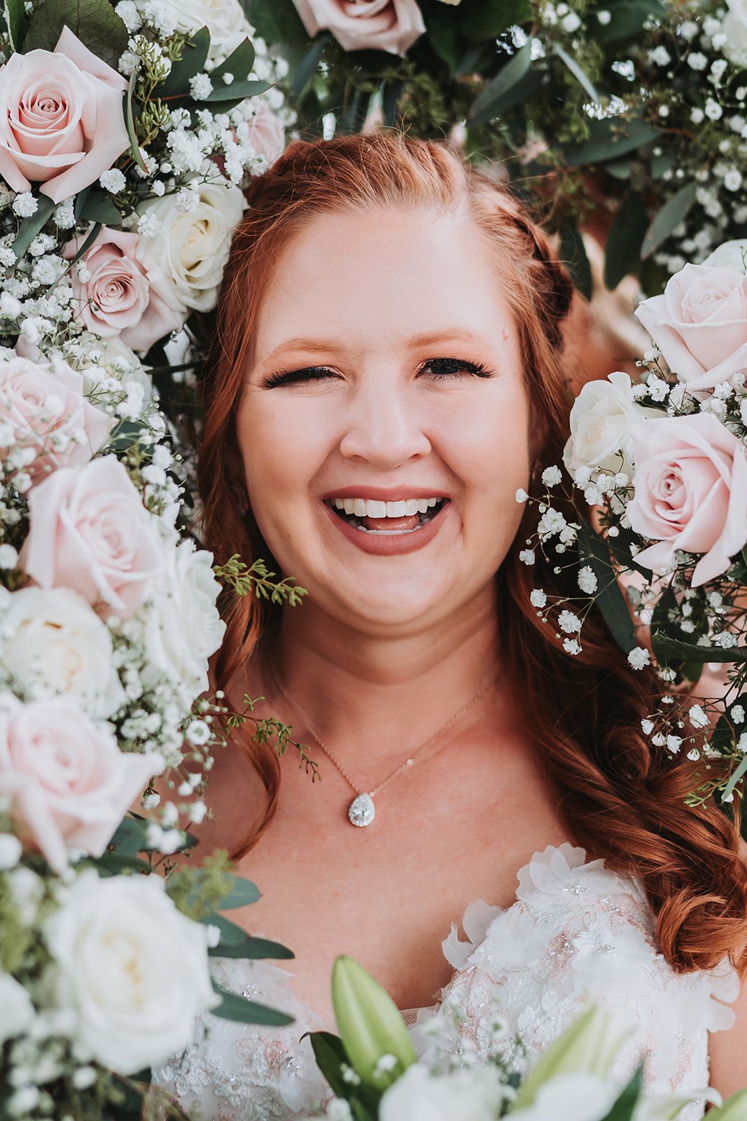  Bride portrait with flower arch 