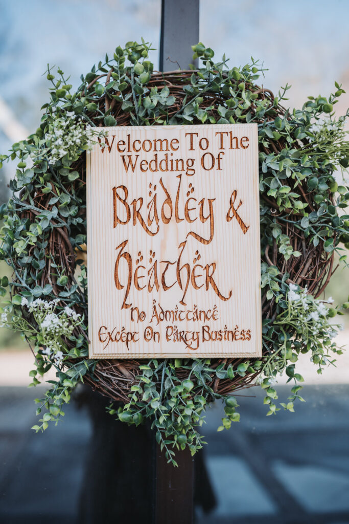Harry Potter inspired Unplugged ceremony sign and decorations.