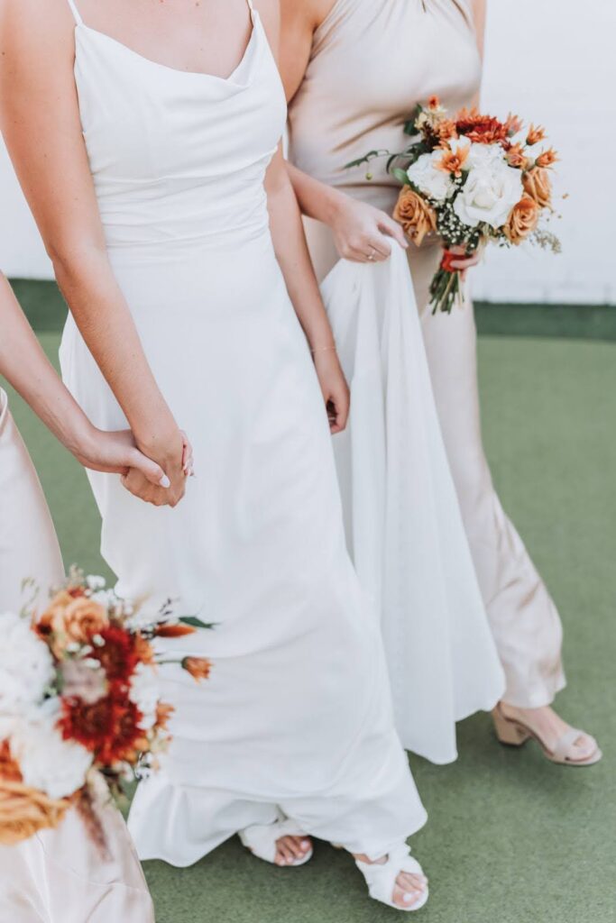 bridesmaids holding hands