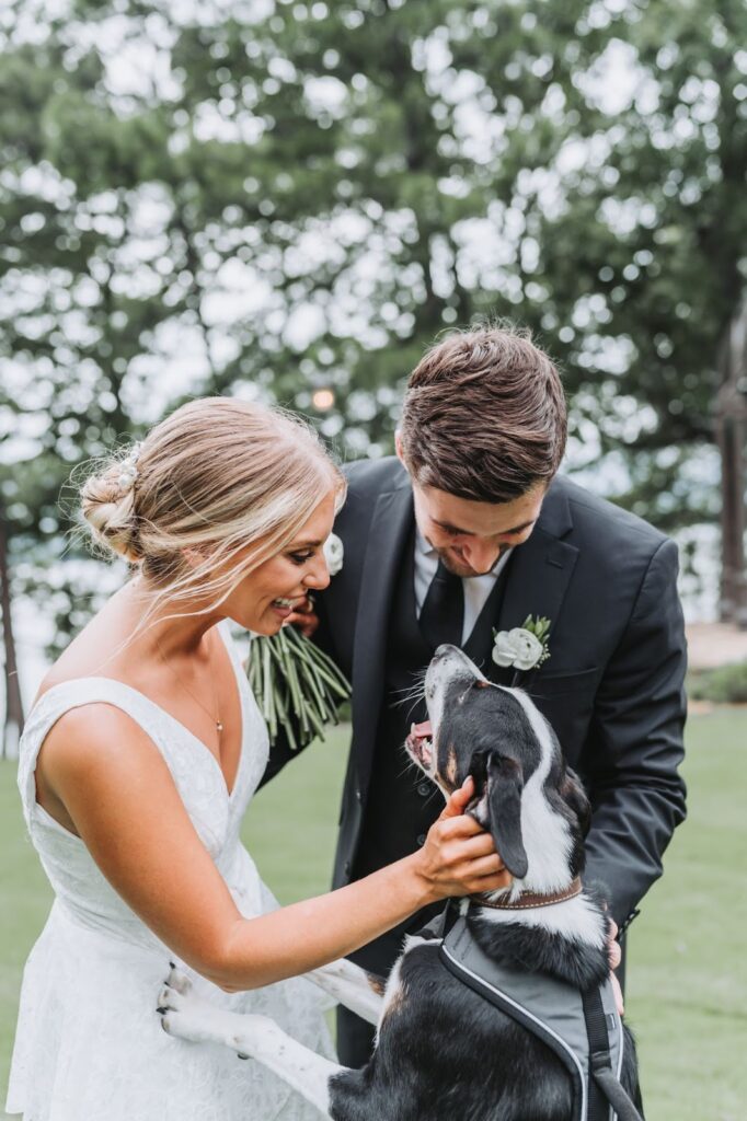 Engaged couple with their dog