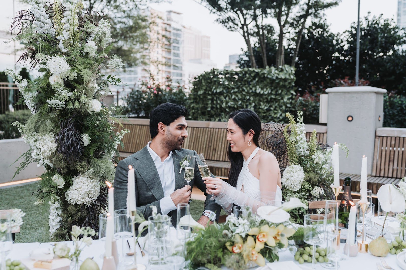a couple toasting each other at their wedding