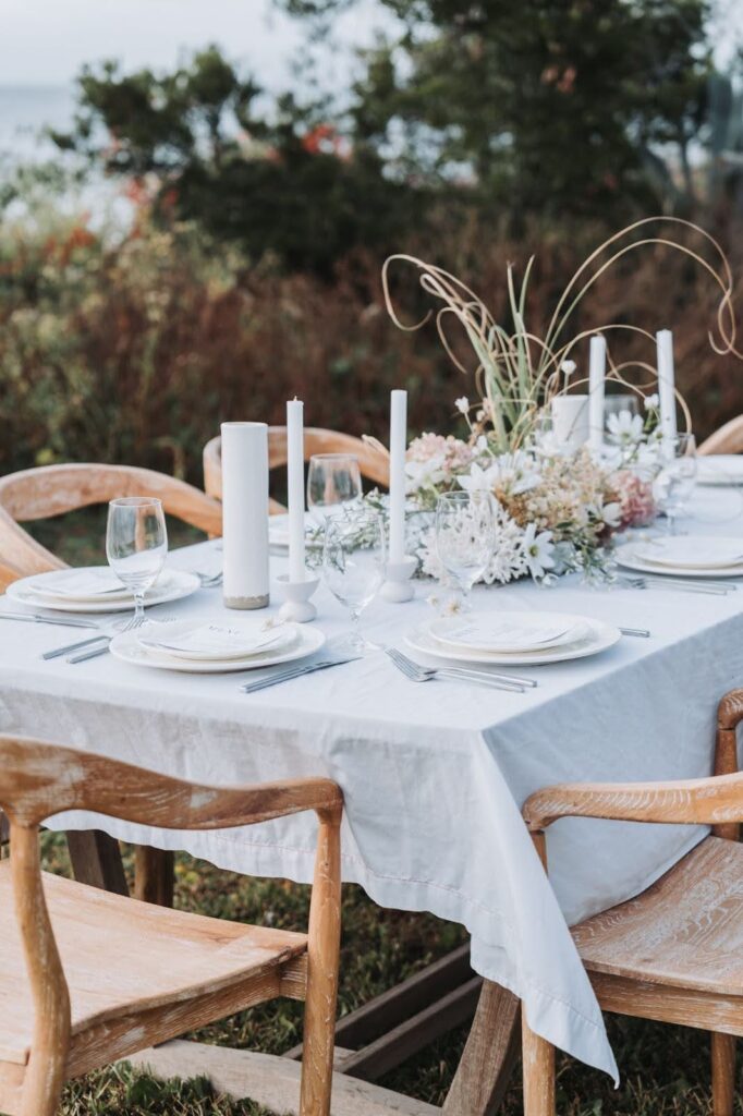 fully set wedding table with candles
