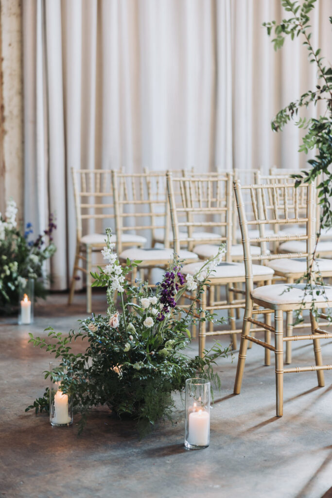 Wedding ceremony chairs with greenery