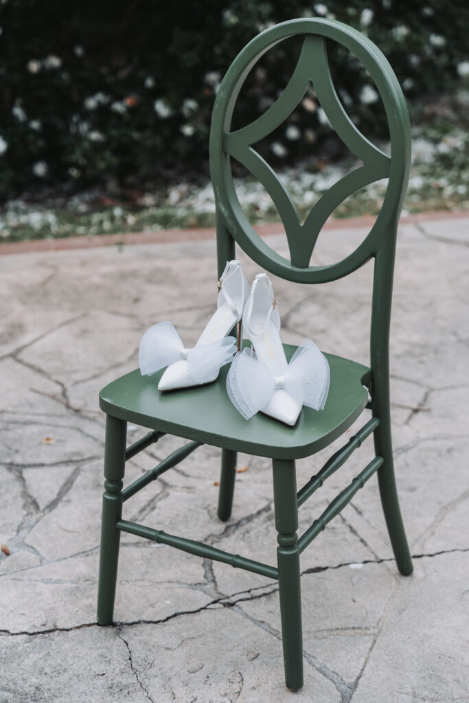 wedding shoes on green chair