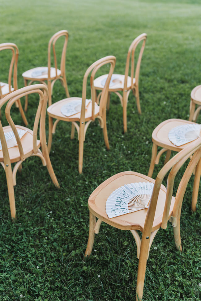 wedding ceremony chairs with personalized wedding fans.