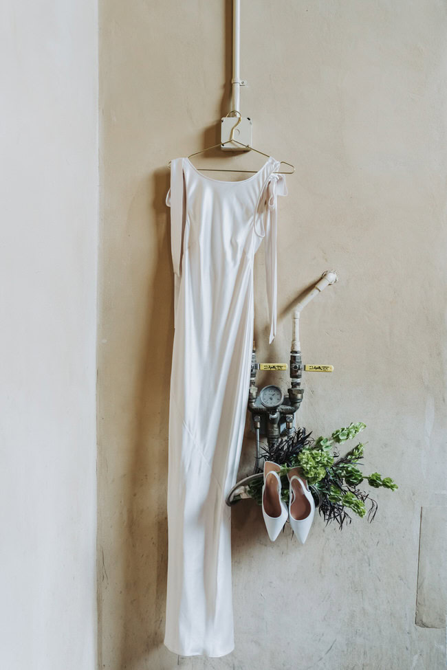 wedding dress, shoes and flowers, hang on the wall