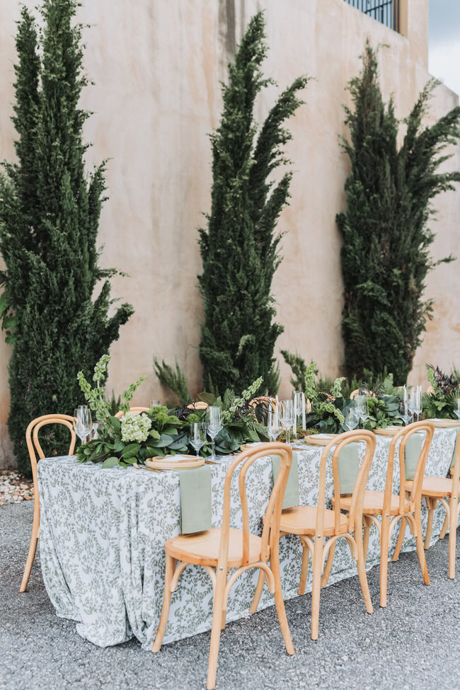 wedding reception table with green acents.