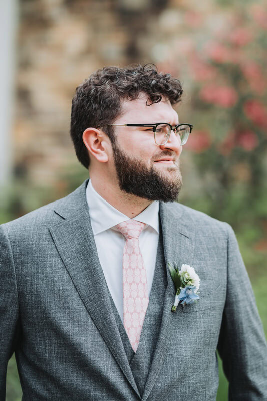 groom looks off into distance