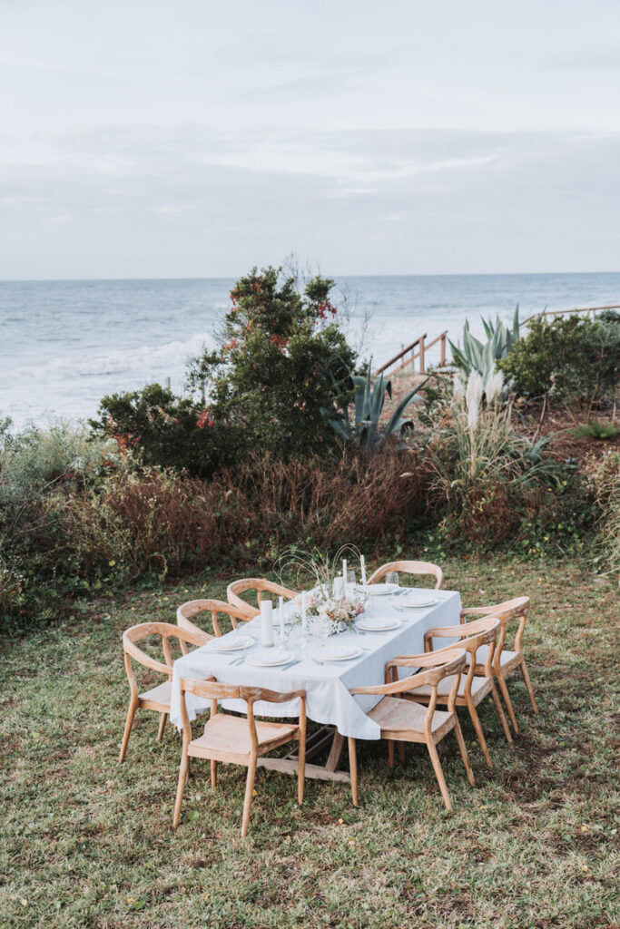 wedding elopement reception table next to the beach