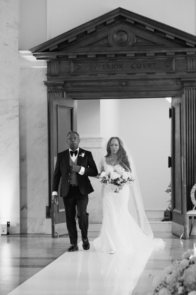 Father walks bride down the aisle at the Dekalb History Museum