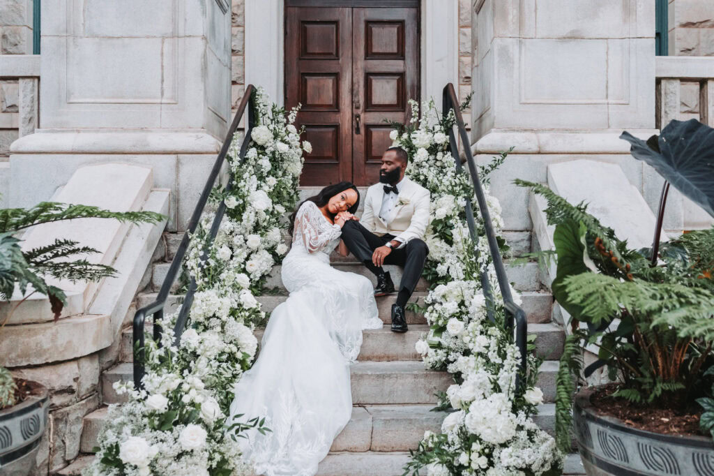 Bride and groom portraits on the grand staircase at Historic Dekalb Courthouse