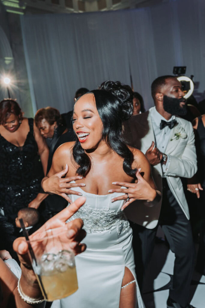 Bride dances during wedding reception at the dekalb courthouse wedding venue